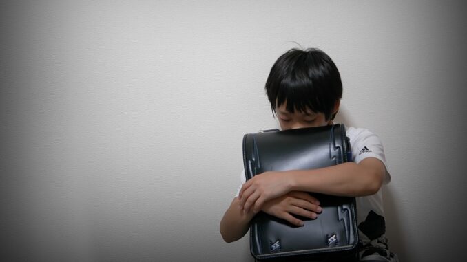 Niño japonés víctima de ijime en la escuela (Foto Zue) - 2